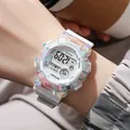 Close-up detail of a waterproof digital sports watch with gradient macaron finish. - White