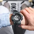 Close-up of camouflage sport digital watch on wrist with water resistant feature - Camo Black