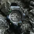 Close-up of a rugged camouflage digital watch on a dark volcanic rock background - Camo Black
