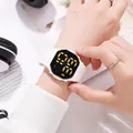 Stylish white silicone strap LED digital sports watch with large display shown on wrist - White