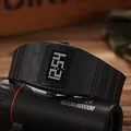 Close-up of stylish black square digital watch with silicone strap on a telescope prop - Black