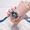 Close-up of a transparent digital sports watch with a luminous display worn on the wrist - Black