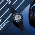 Close-up detail of a men's black multifunctional digital sports watch with luminous display. - Black Blue