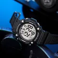 Detailed view of waterproof digital sports watch with luminous display and resin strap - Black Silver