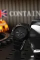 Close-up view of a rugged black matte sports watch featuring an octagonal bezel and digital display - Black