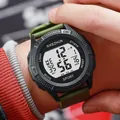 Sporty digital watch for teenagers with army green silicone strap on wrist, close-up - Army Green