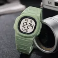 Detailed close-up view of a SIKEZHUN men's green outdoor sports digital watch with WR30M. - Tea Green