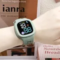 Square mint green digital sports watch featuring astronaut LED display and silicone strap - Matcha Green