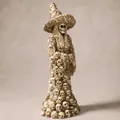 Detailed view of resin Halloween witch skeleton statue with skull robe - White
