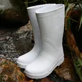 Close-up of white high-tube EVA rain boots with water droplets in a stream - 35-36 / White
