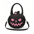 Front view of a black Halloween pumpkin handbag with a pink Jack-o'-lantern face - Black With Pink Face (Style B)