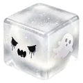 Dettaglio del cubo squishy di Halloween glitterato con grafica di fantasmi e visi spaventosi - polvere brillante argentata