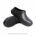 Black steel-toe safety clogs showing side view and slip-resistant sole grip - 36-37 / Style 127 / Black