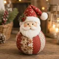 Detailed view of a handcrafted quilted Santa Claus ornament with rustic patchwork - Santa Claus (A)