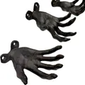 Macro view of vintage resin hand-shaped wall hooks featuring a rustic cast iron texture - Set of 3 / Black