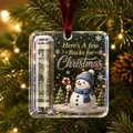 Detailed view of a clear acrylic Christmas money holder ornament with a cute snowman - Snowman