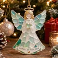 Dettaglio ravvicinato di un angelo di Natale decorativo con ali in vetro di mare - Angelo