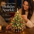 Detailed view of the DIY beaded Christmas tree kit with warm festive lighting. - Colorful Beaded Christmas Tree