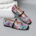 Close-up of vintage floral Mary Jane flats with pleated texture and black strap buckle - 35 / Purple