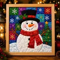Detailed view of Christmas fabric art painting featuring a snowman in a wooden frame - Snowman