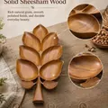 Detail of the natural grain on a divided wooden leaf-shaped tray made of Sheesham wood. - Wooden Leaf Shaped Tray