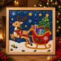 Close-up of a Christmas quilted fabric art painting with a reindeer and sleigh design. - Reindeer