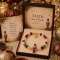 Detailed view of nutcracker charm on a festive Christmas beaded bracelet in a gift box - Nutcracker (Bracelet Card Packaging)
