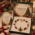 Close-up view of Christmas blessings bracelet with tree charm in a green gift box - Christmas Tree (Bracelet Card Packaging)
