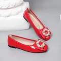 Detail shot of elegant red patent leather ballet flats with pearl crystal square buckle - 35 / Red