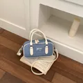 Vintage denim blue bowling bag with white trim and handles for women - Beige