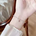 Elegant minimalist silver-plated bangle with a delicate circular charm for women - Minimalist Geometric Bead Style (MY35583)