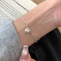 Chic minimalist double-layer silver bracelet with polished heart pendant and beads - Double Layer Heart Pendant Style (MY35837)