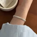 Elegant minimalist silver flat snake chain bracelet for women featuring Korean fashion style - Flat Snake Chain Style (MY35845)