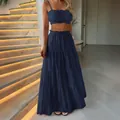 Elegant navy blue two-piece set with a ruffled crop top and tiered maxi skirt for vacation - S / Top And Bottom / Navy Blue