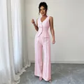 Elegante completo tailleur rosa senza maniche con piping bianco a contrasto chic - Taglia S / Top E Pantaloni / Rosa