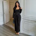 Elegant black long-sleeve bodycon maxi dress featuring a stylish waist knot detail for women - S / Dresses / Black