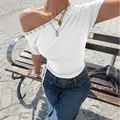 Stylish white slim-fit one-shoulder short sleeve t-shirt featuring elegant button detailing - XS / Tops / White