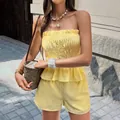 Stylish yellow and white striped tube top and matching shorts set for summer fashion - Yellow