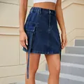 Detail view of dark blue denim cargo skirt with ribbon straps and elastic waist. - S / Bottoms / Dark Blue