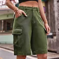 Close-up of olive green denim cargo shorts featuring functional side flap pockets. - S / Bottoms / Army Green