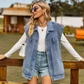 Oversized washed blue denim vest with functional pockets for a casual western street look - S / Tops / Blue
