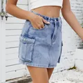 Vintage washed blue denim cargo mini skirt featuring large functional flap pockets - S / Bottoms / Light Blue