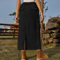 Back view of a black denim cargo midi skirt with a back split and drawstring hem detail - S / Bottoms / Black