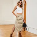 Detailed view of a stylish khaki drawstring denim midi skirt with white crop tank top - S / Light Khaki