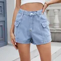 Detail view of light blue denim cargo shorts with side pockets and elastic waist. - S / Bottoms / Light Blue