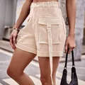 Women's high-waisted beige denim cargo shorts featuring a large pocket and decorative long strap - S / Light Khaki
