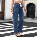 Detailed shot of women's blue denim drawstring pants with utility cargo pockets - S / Bottoms / Dark Blue