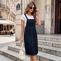 Vintage-style denim overall dress with wide straps and front pocket shown in an urban setting - S / Blue Nightdress