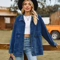 Professional outdoor shot of a vintage loose blue denim jacket with stylish large pockets - S / Tops / Dark Blue