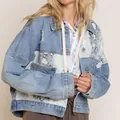 Detail view of oversized distressed denim jacket with grey snake-skin patchwork design. - S / Tops / Python Pattern